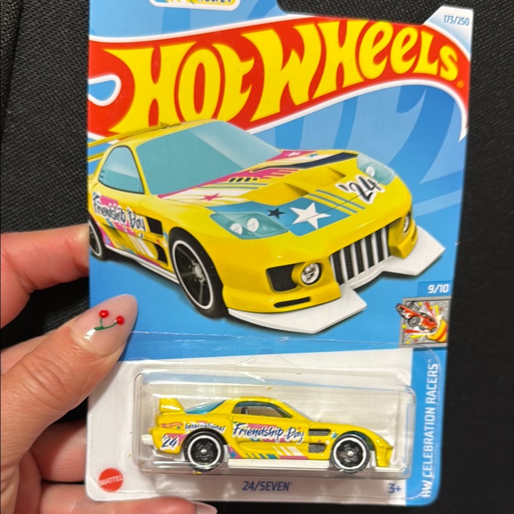 Yellow and White Hot Wheels Toy Car with Racing Graphics